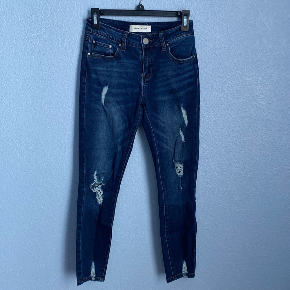 Ripped blue jeans. Ashley Mason size 5